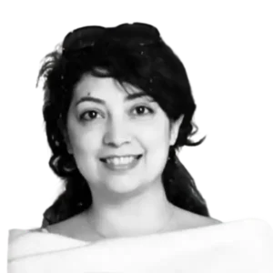 Smiling portrait of IELTS coach and educator Shadi Khosravi against a neutral background